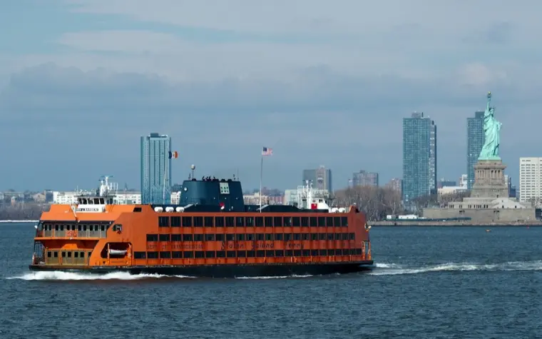Orange Staten Island Ferry crossing New York Harbor